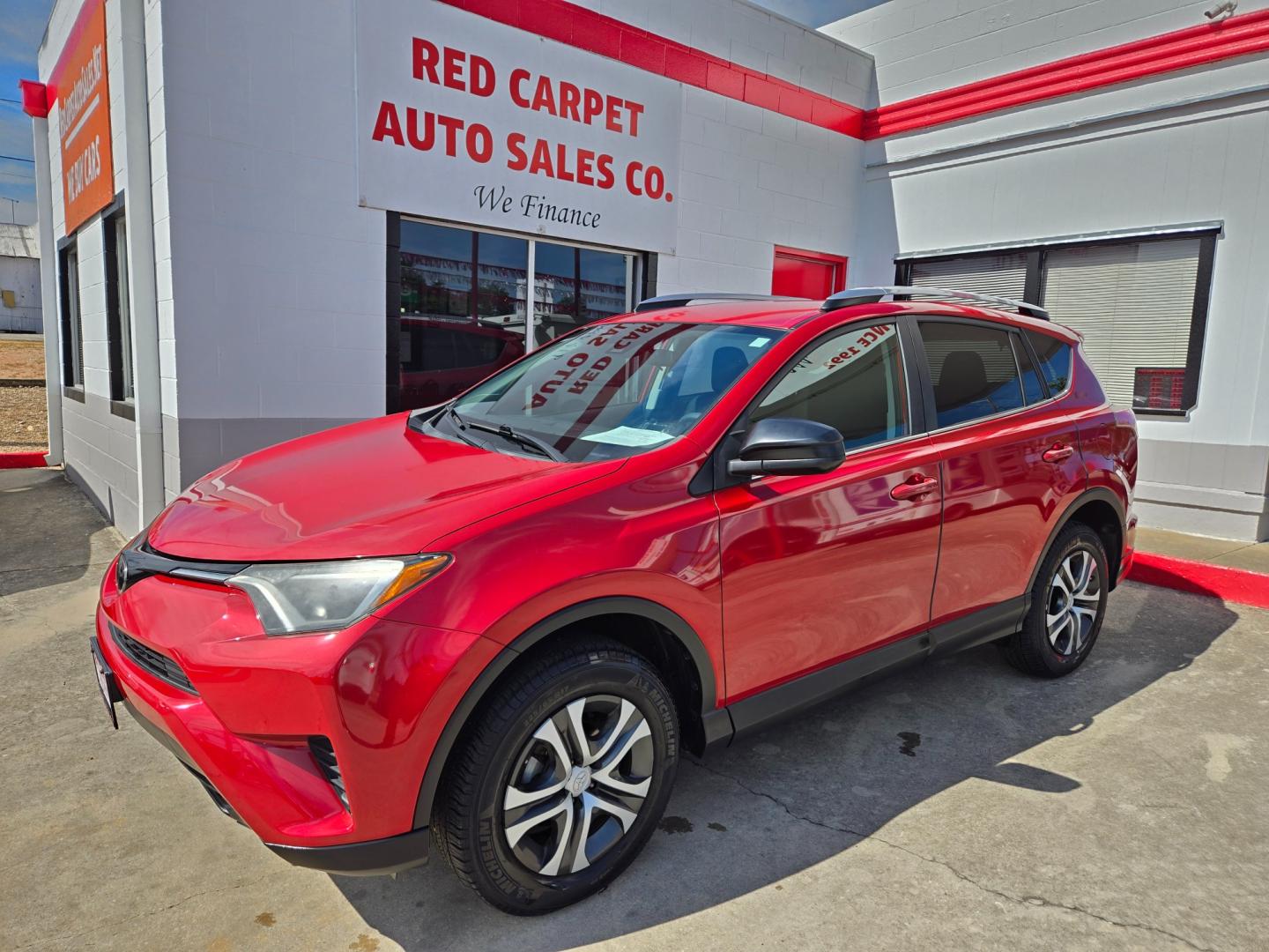 2017 Red Toyota RAV4 LE FWD (2T3ZFREV9HW) with an 2.5L L4 DOHC 16V engine, 6A transmission, located at 503 West Court, Seguin, TX, 78155, (830) 379-3373, 29.568621, -97.969803 - Photo#0